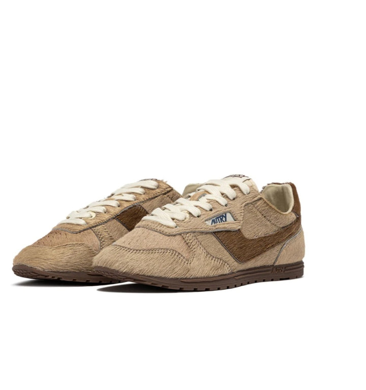 AUTRY WINDSPIN SNEAKERS IN PONY IVORY