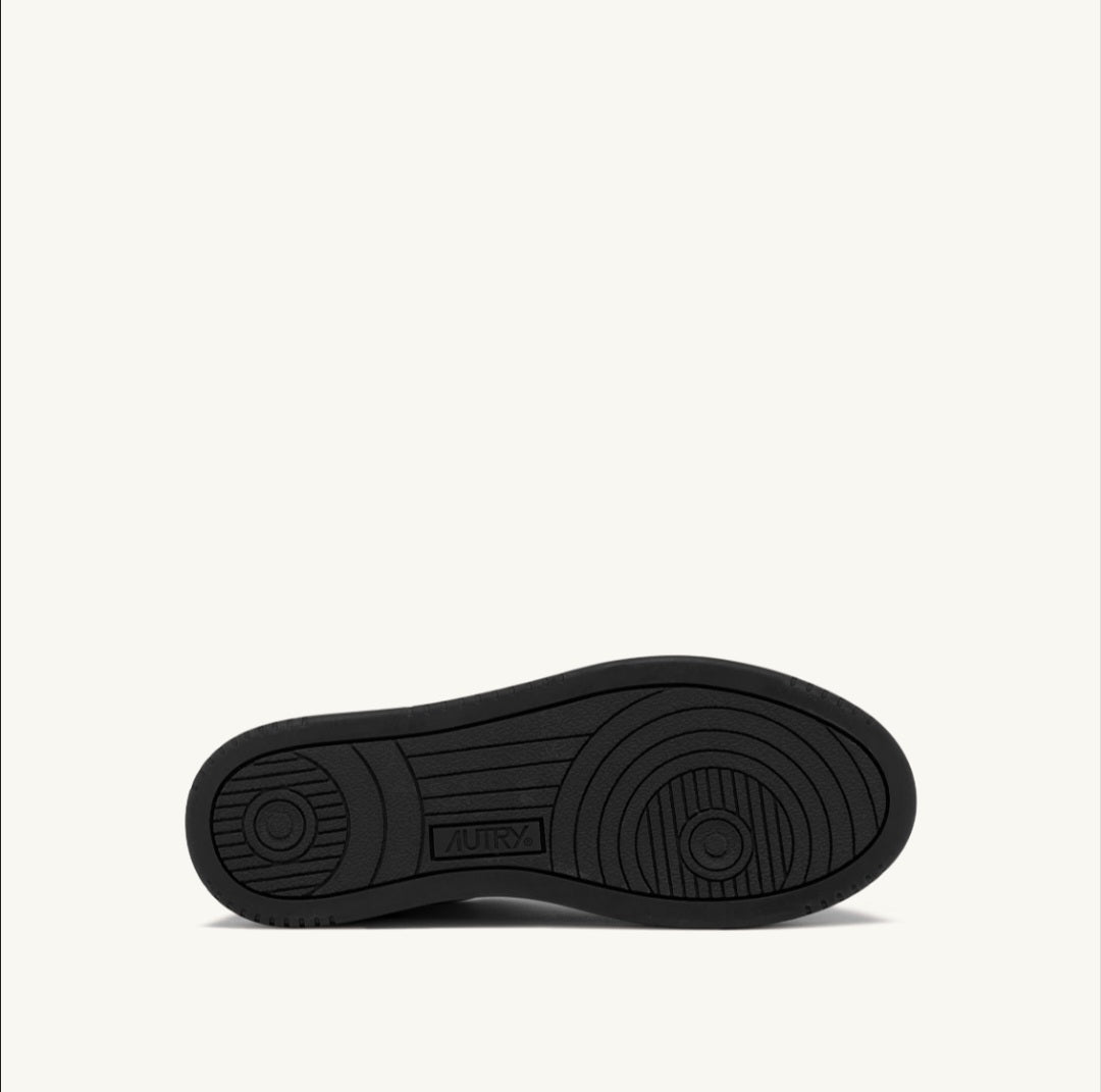 AUTRY MEDALIST PLATFORM SNEAKERS IN WHITE AND BLACK LEATHER