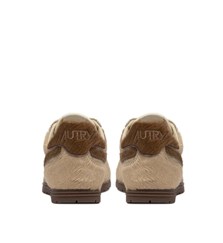 AUTRY WINDSPIN SNEAKERS IN PONY IVORY