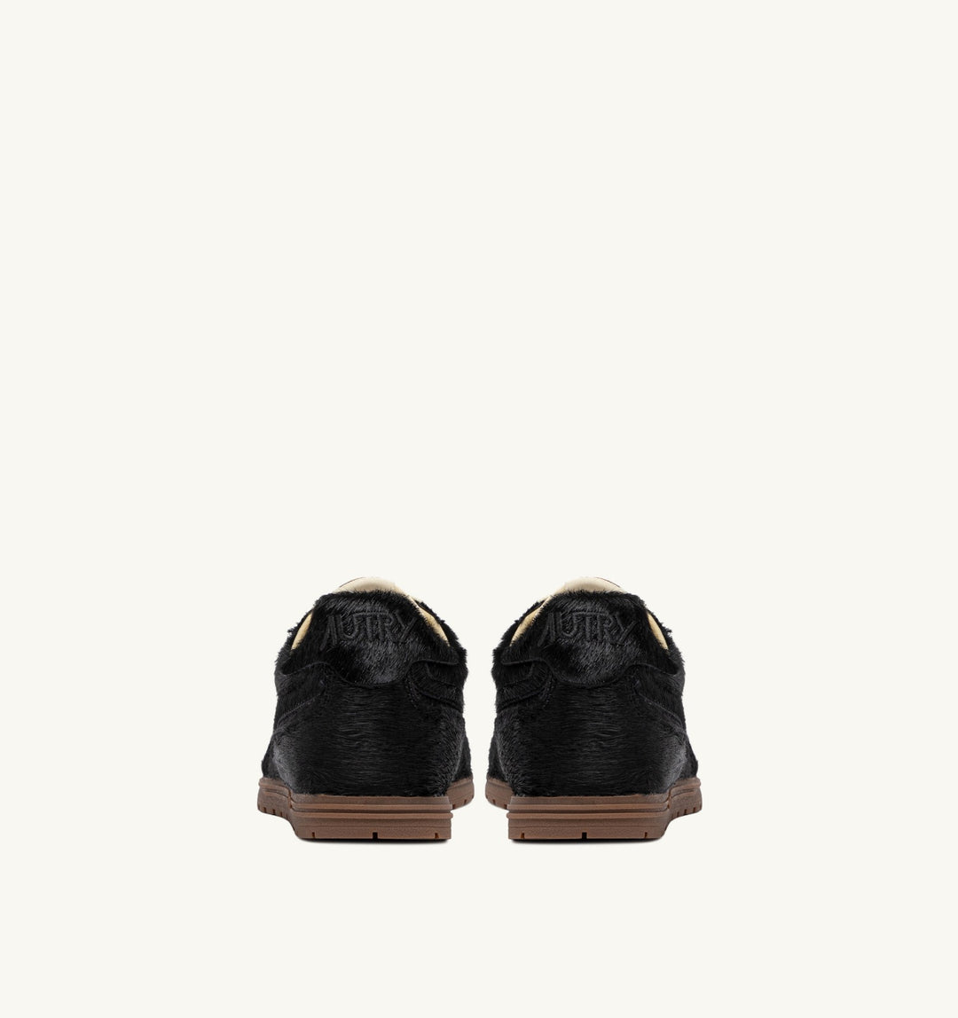 AUTRY WINDSPIN SNEAKERS IN BLACK PONY SUEDE