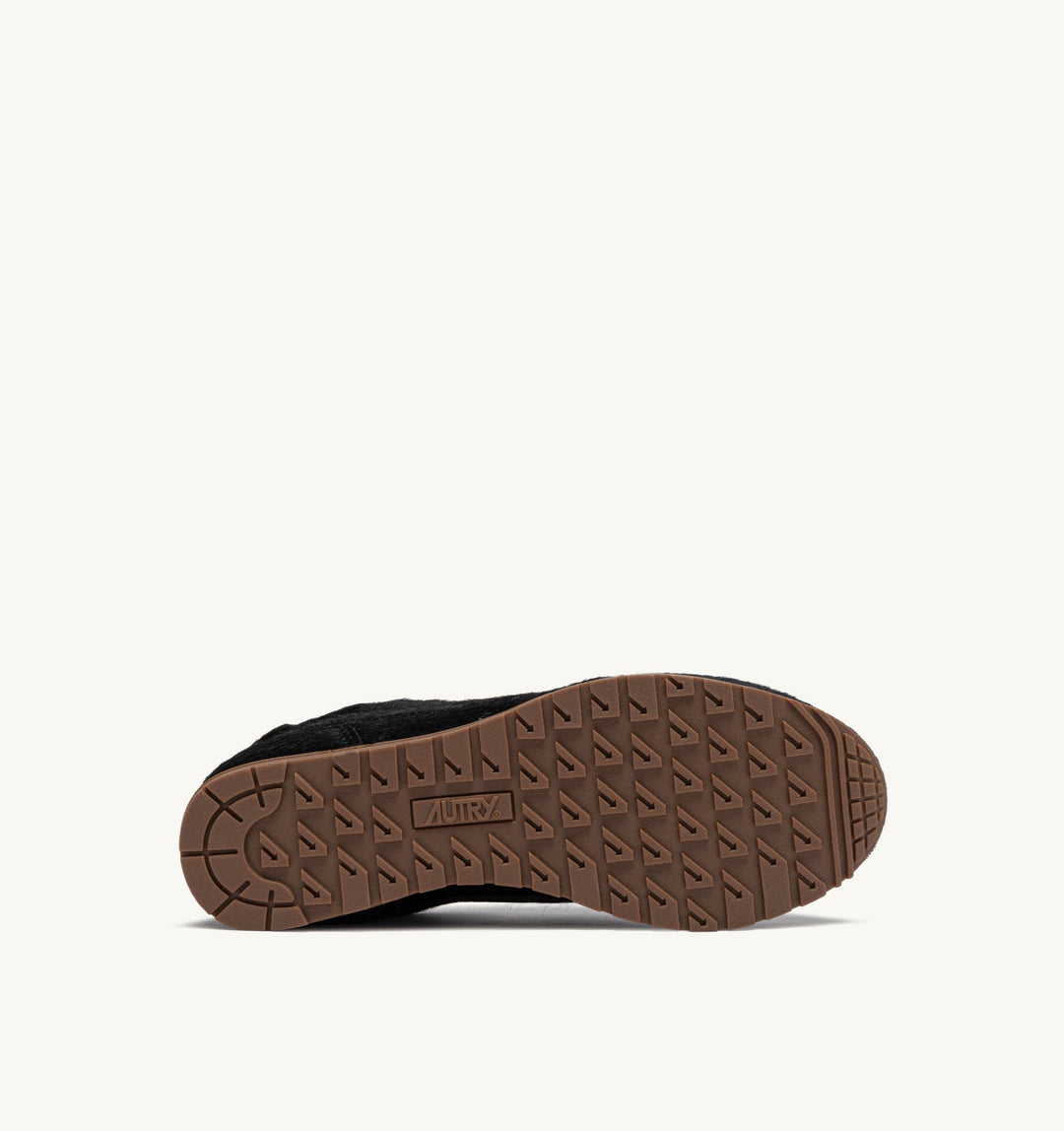 AUTRY WINDSPIN SNEAKERS IN BLACK PONY SUEDE