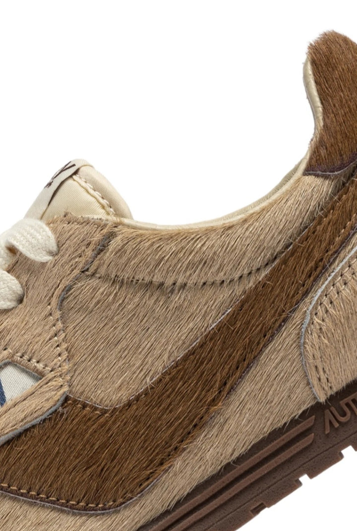 AUTRY WINDSPIN SNEAKERS IN PONY IVORY