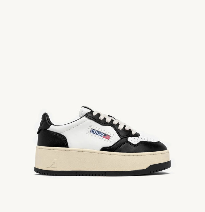AUTRY MEDALIST PLATFORM SNEAKERS IN WHITE AND BLACK LEATHER