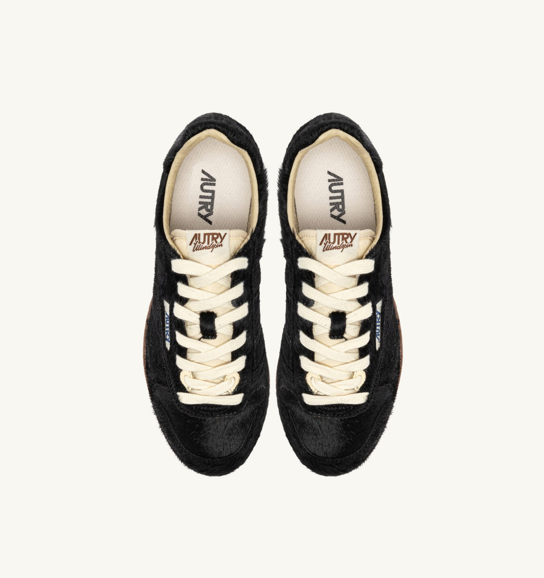 AUTRY WINDSPIN SNEAKERS IN BLACK PONY SUEDE
